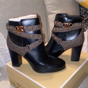Black/ brown buckled Michael Kors boots